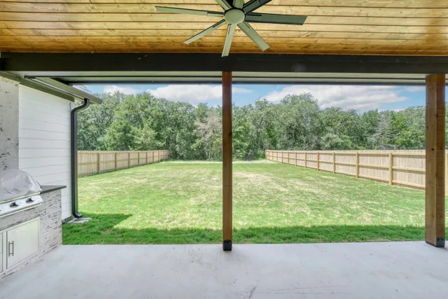 a view of a yard from a window