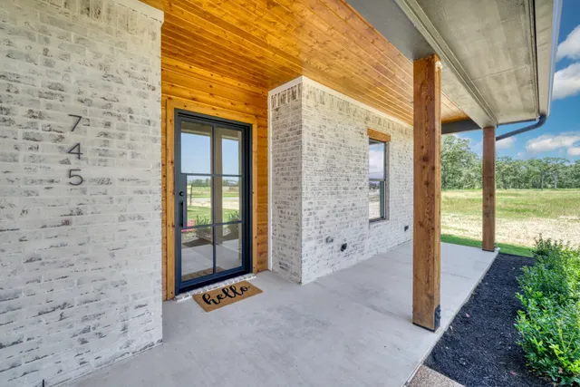 a view of an entryway with a door