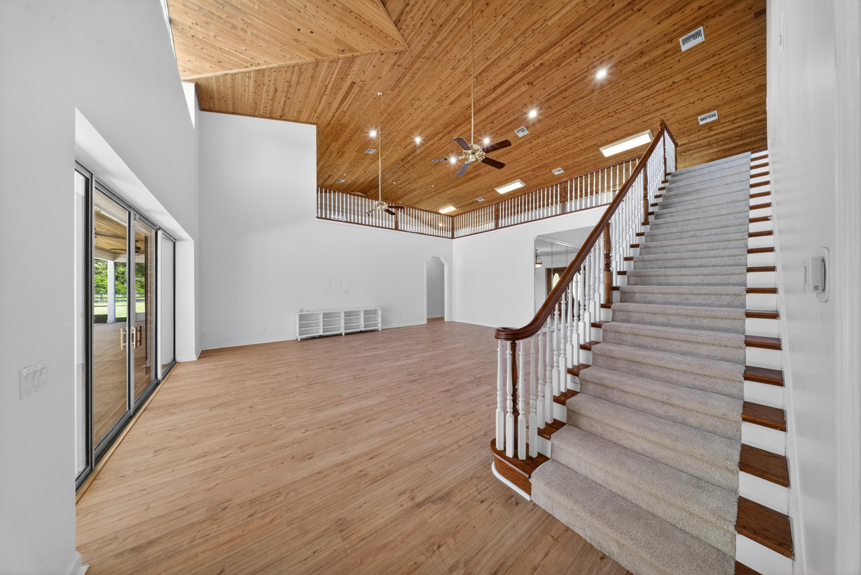 8686 Andrews Avenue Fort Pierce, FL 34945 - Photo 38 of 76 a view of entryway with wooden floor