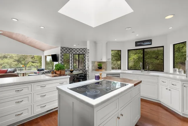a view of a livingroom with furniture and window