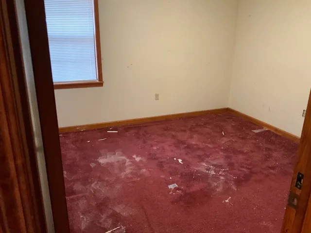 an empty room with a window