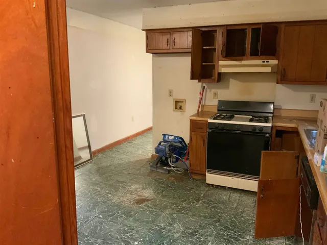 a view of a backyard of the house