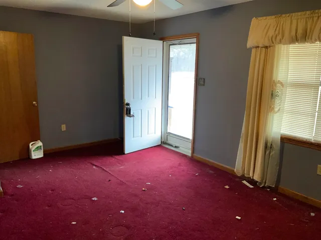 an empty room with windows