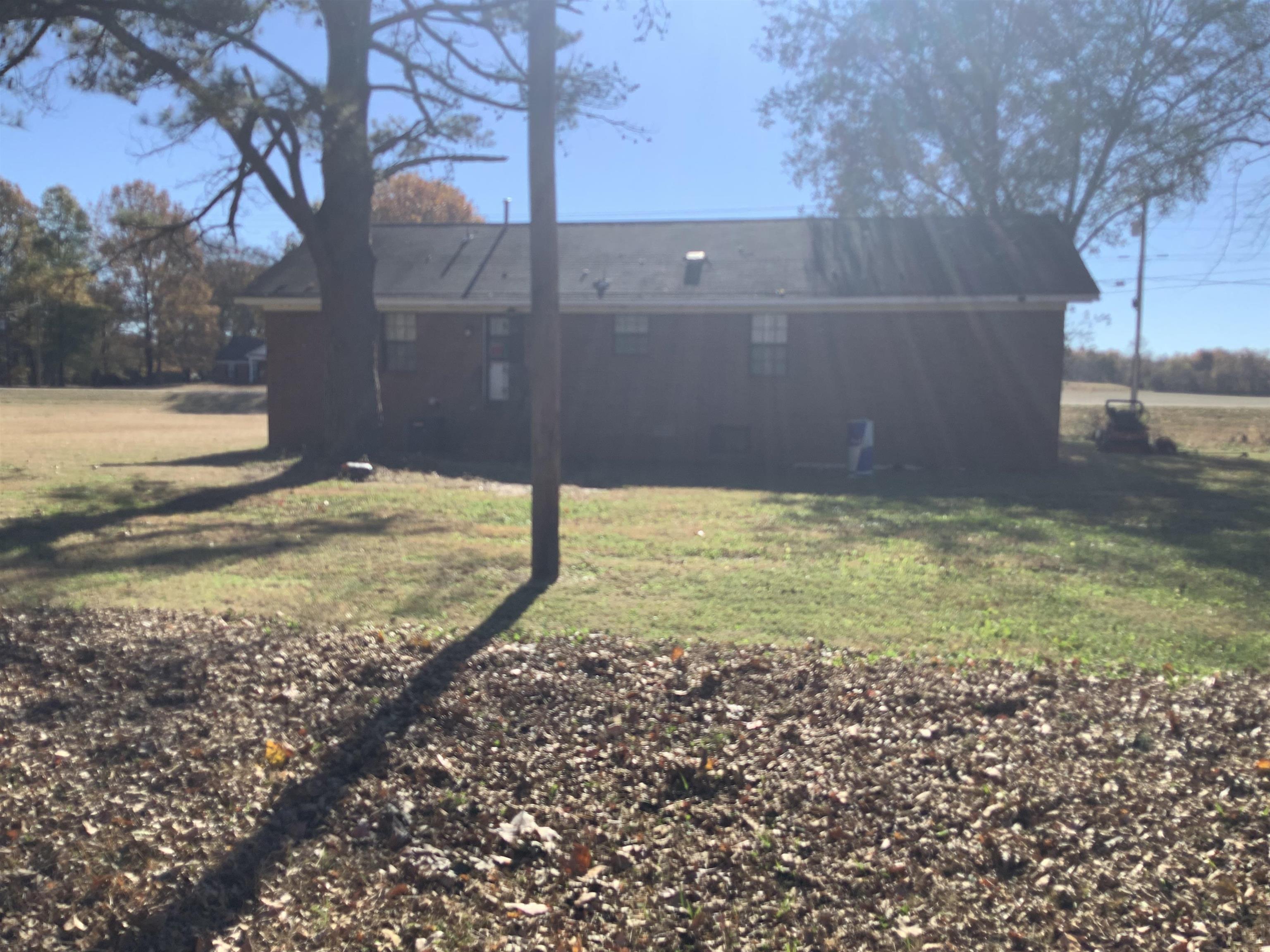 1860 Highway 59 Covington, TN 38019 - Photo 21 of 32 a view of a backyard of the house