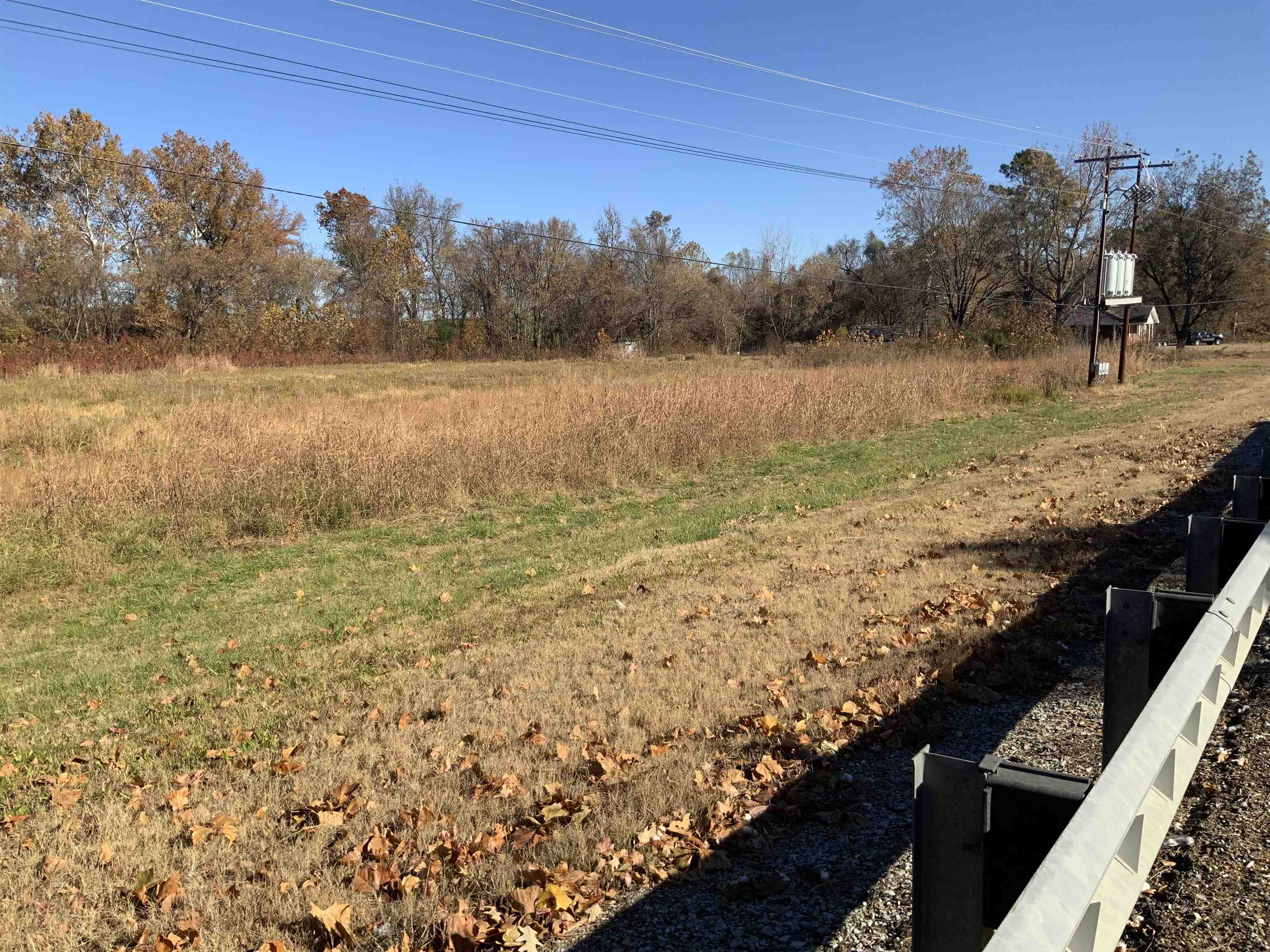 1860 Highway 59 Covington, TN 38019 - Photo 26 of 32 a view of a lake with a mountain