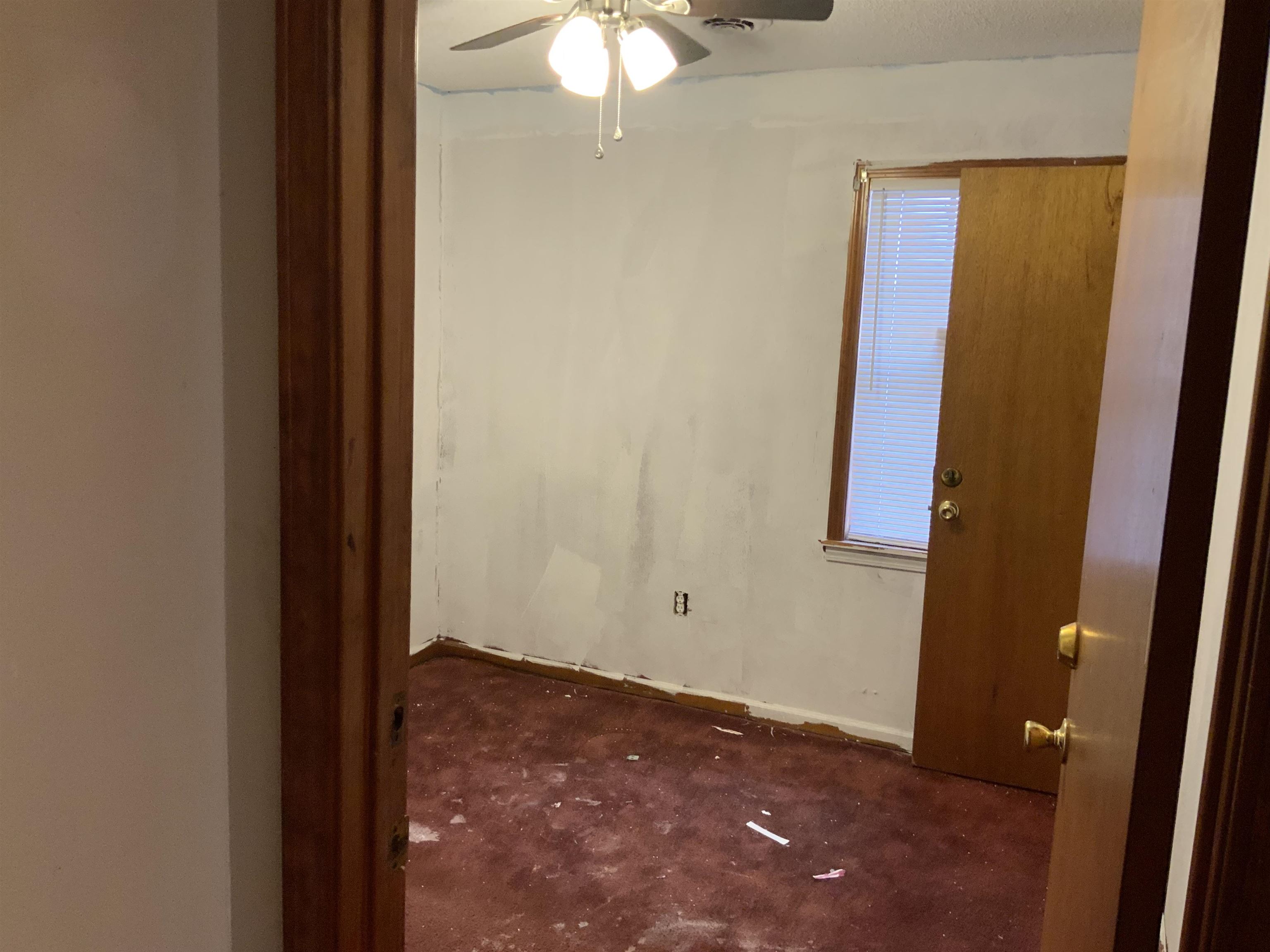1860 Highway 59 Covington, TN 38019 - Photo 7 of 32 wooden floor in an empty room with a mirror