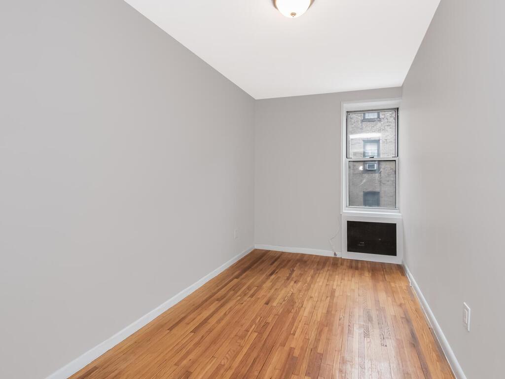 6535 Broadway, Unit 4B Bronx, NY 10471 - Photo 10 of 11 Spare room with light wood finished floors and baseboards