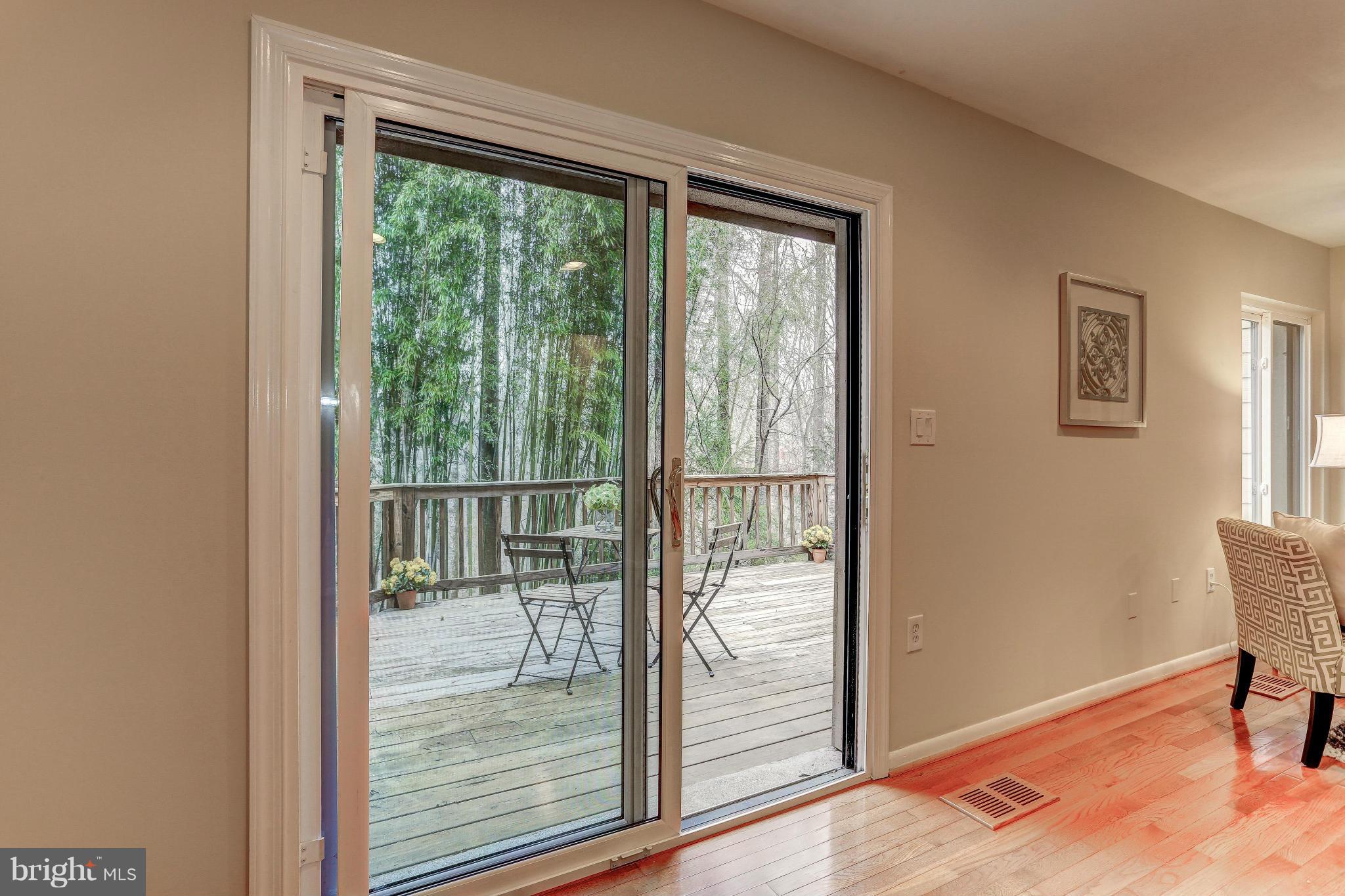 11522 Hearthstone Court Reston, VA 20191 - Photo 12 of 27 Living room opens to oversized treelined deck