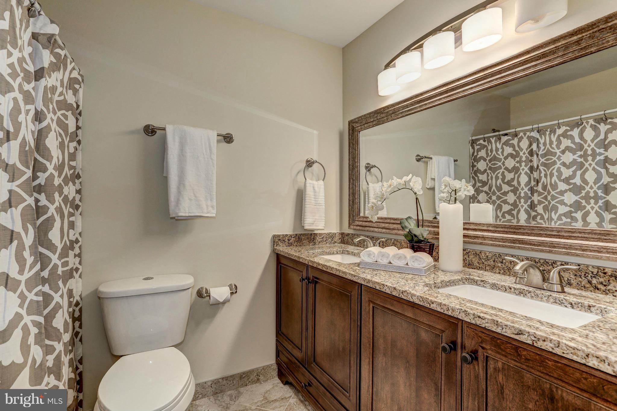 11522 Hearthstone Court Reston, VA 20191 - Photo 20 of 27 Newly remodeled hall bath with granite dual vanity