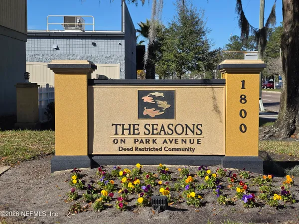 a view of a room with wooden floors and led lights