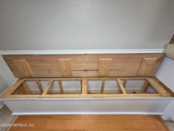 a view of a room with racks on the wall