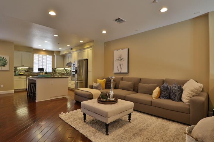 6372 Byron Lane San Ramon, CA 94582 - Photo 15 of 53 a living room with stainless steel appliances kitchen island granite countertop furniture and a view of kitchen