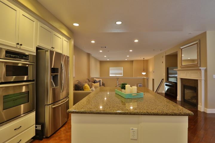 6372 Byron Lane San Ramon, CA 94582 - Photo 16 of 53 a kitchen with stainless steel appliances granite countertop refrigerator sink and stove