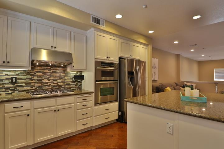 6372 Byron Lane San Ramon, CA 94582 - Photo 17 of 53 a kitchen with counter top space cabinets and stainless steel appliances