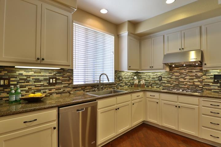 6372 Byron Lane San Ramon, CA 94582 - Photo 21 of 53 a kitchen with sink cabinets and window