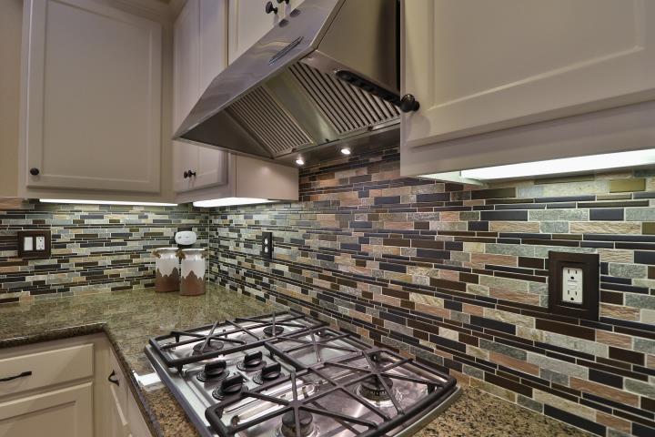 6372 Byron Lane San Ramon, CA 94582 - Photo 22 of 53 a kitchen with a stove and cabinets