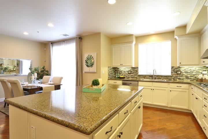 6372 Byron Lane San Ramon, CA 94582 - Photo 24 of 53 a kitchen with stainless steel appliances granite countertop a sink and a counter top space