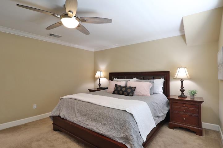 6372 Byron Lane San Ramon, CA 94582 - Photo 34 of 53 a bedroom with a bed and a ceiling fan