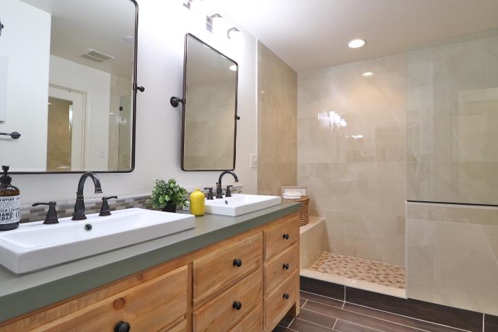 6372 Byron Lane San Ramon, CA 94582 - Photo 37 of 53 a bathroom with a double vanity sink mirror and double