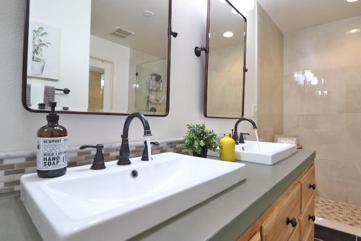 6372 Byron Lane San Ramon, CA 94582 - Photo 38 of 53 a bathroom with a sink and a mirror