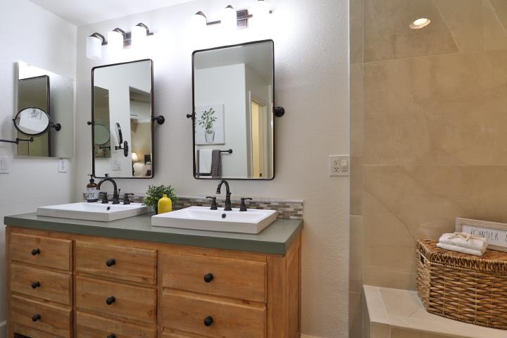 6372 Byron Lane San Ramon, CA 94582 - Photo 39 of 53 a bathroom with a sink and a mirror