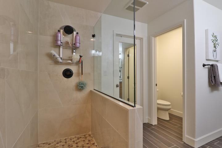 6372 Byron Lane San Ramon, CA 94582 - Photo 41 of 53 a bathroom with a shower and a toilet