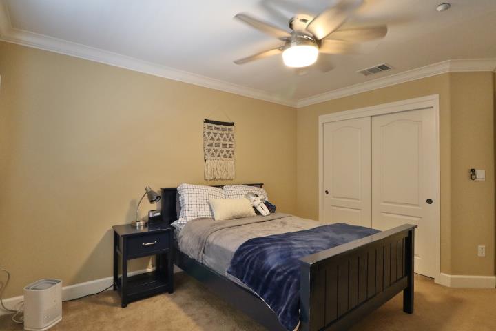 6372 Byron Lane San Ramon, CA 94582 - Photo 45 of 53 a bedroom with a bed and a ceiling fan