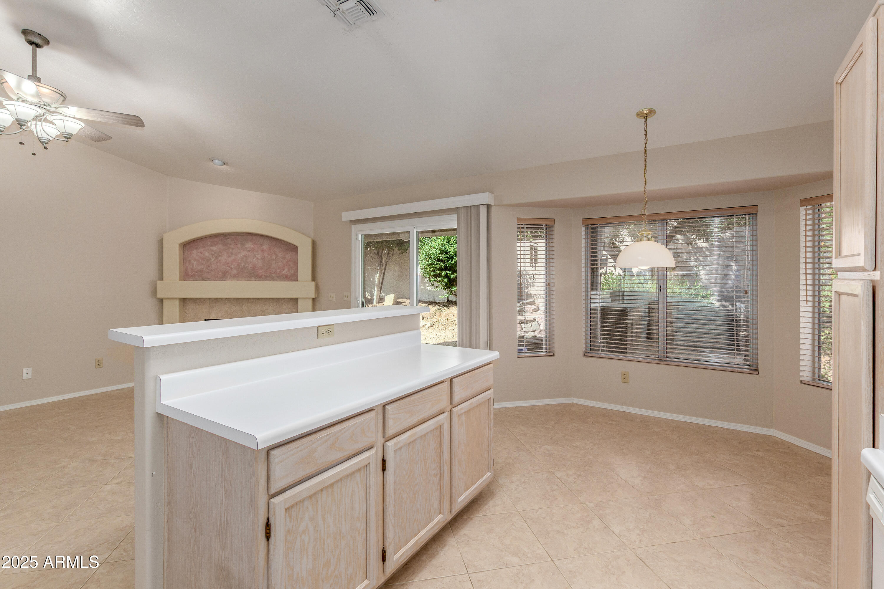 8578 South Maple Avenue Tempe, AZ 85284 - Photo 11 of 28 a room with a window bed and cabinets