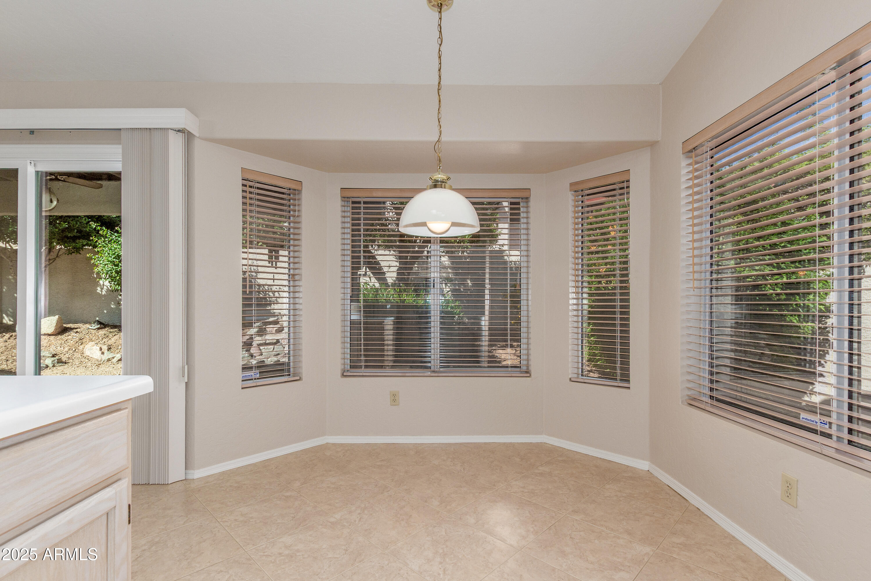 8578 South Maple Avenue Tempe, AZ 85284 - Photo 13 of 28 a view of an empty room with a window