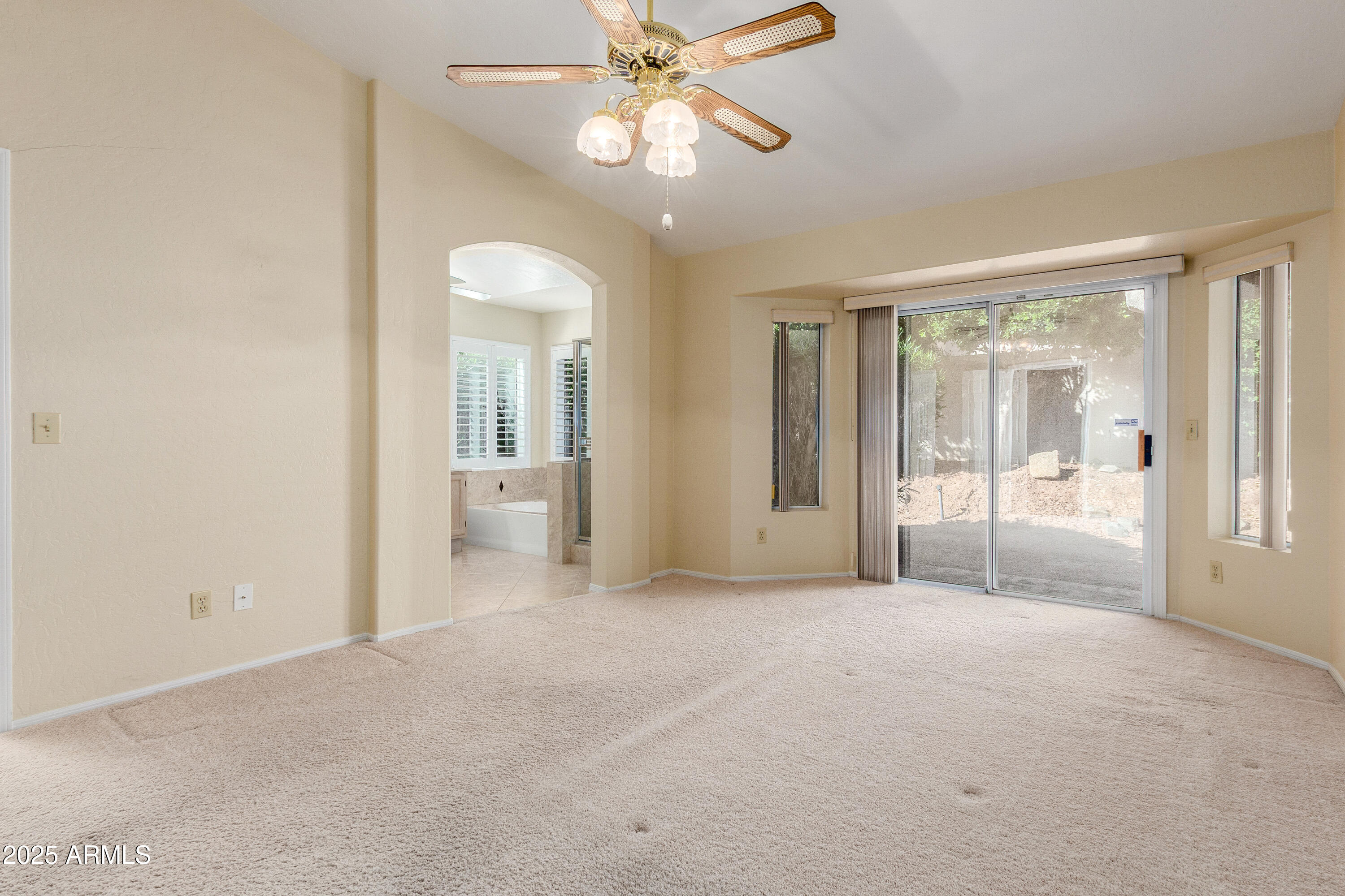 8578 South Maple Avenue Tempe, AZ 85284 - Photo 14 of 28 a view of a big room with chandelier fan and windows