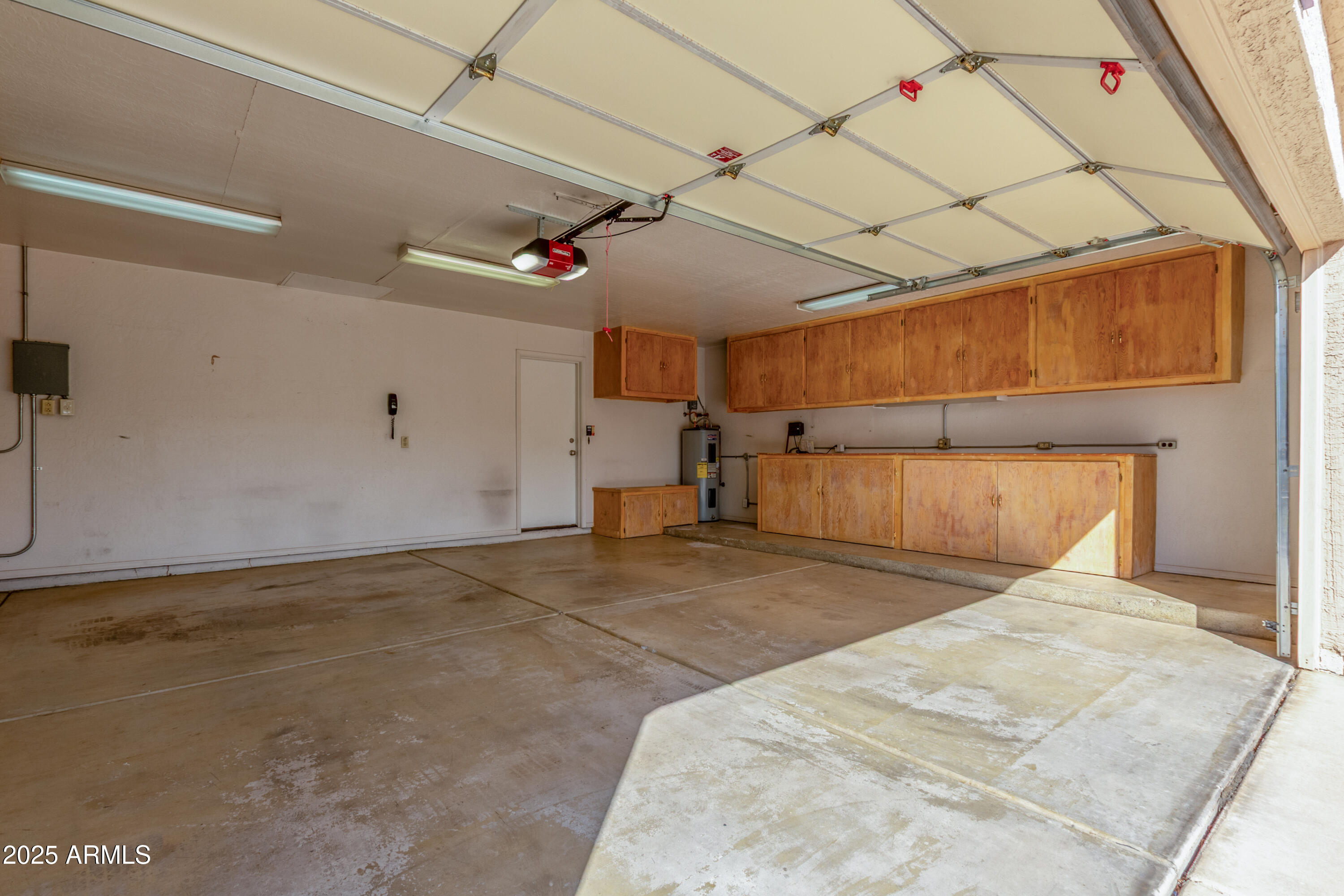 8578 South Maple Avenue Tempe, AZ 85284 - Photo 26 of 28 a bedroom with a bed and wooden floor