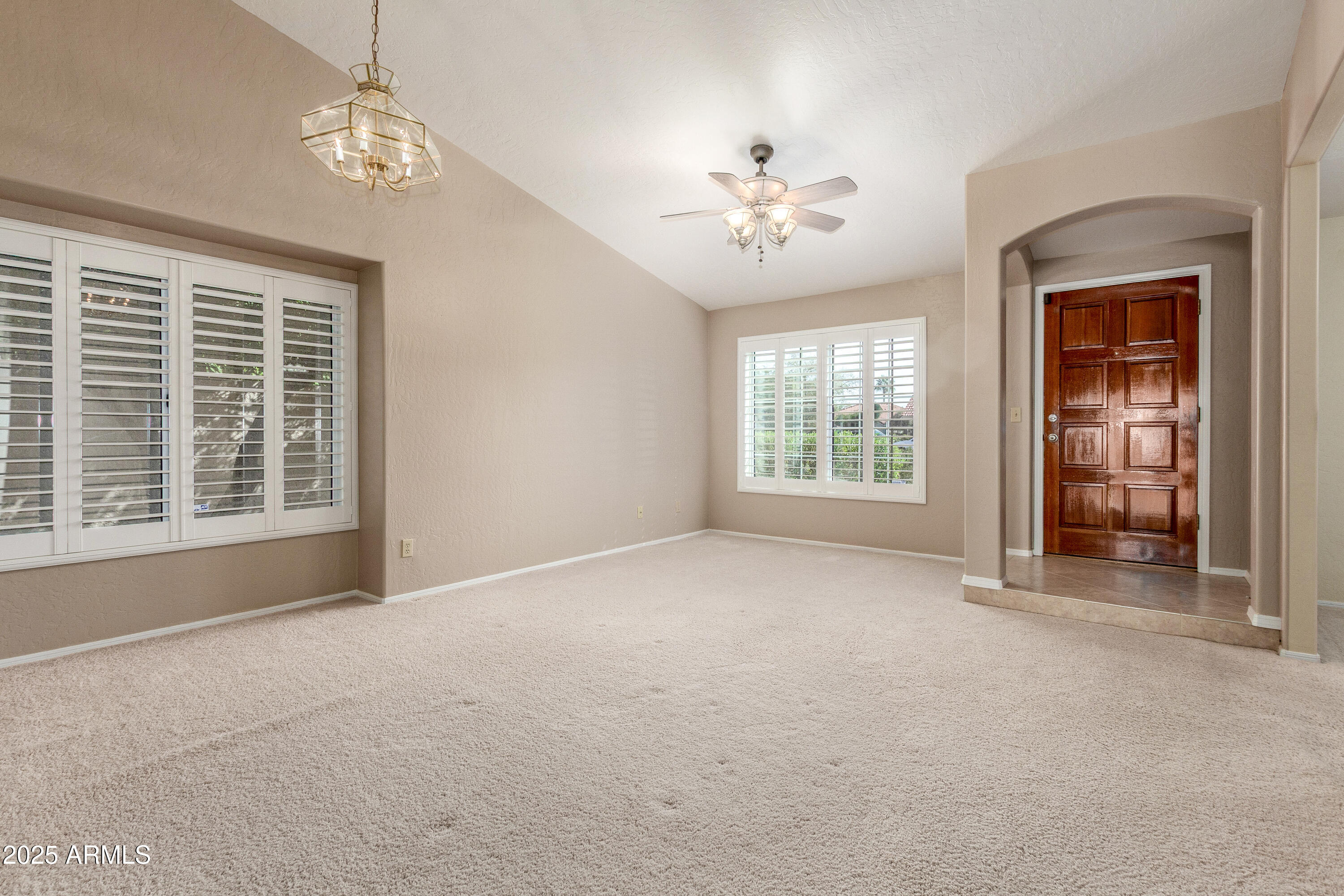 8578 South Maple Avenue Tempe, AZ 85284 - Photo 3 of 28 a view of an empty room with a window