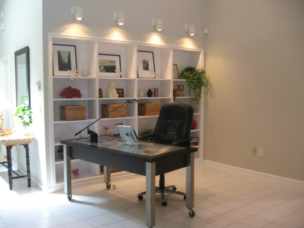 245 Northwest 70th Street Boca Raton, FL 33487 - Photo 6 of 39 a view of a workspace with furniture