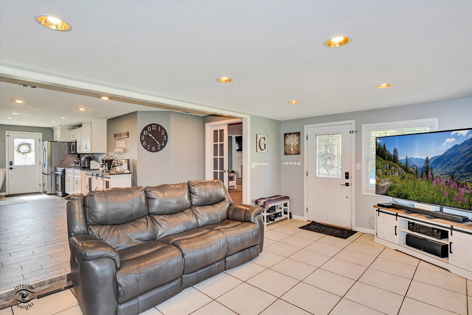 4248 South Youth Camp Road St. Anne, IL 60964 - Photo 13 of 36 a living room with furniture and a flat screen tv