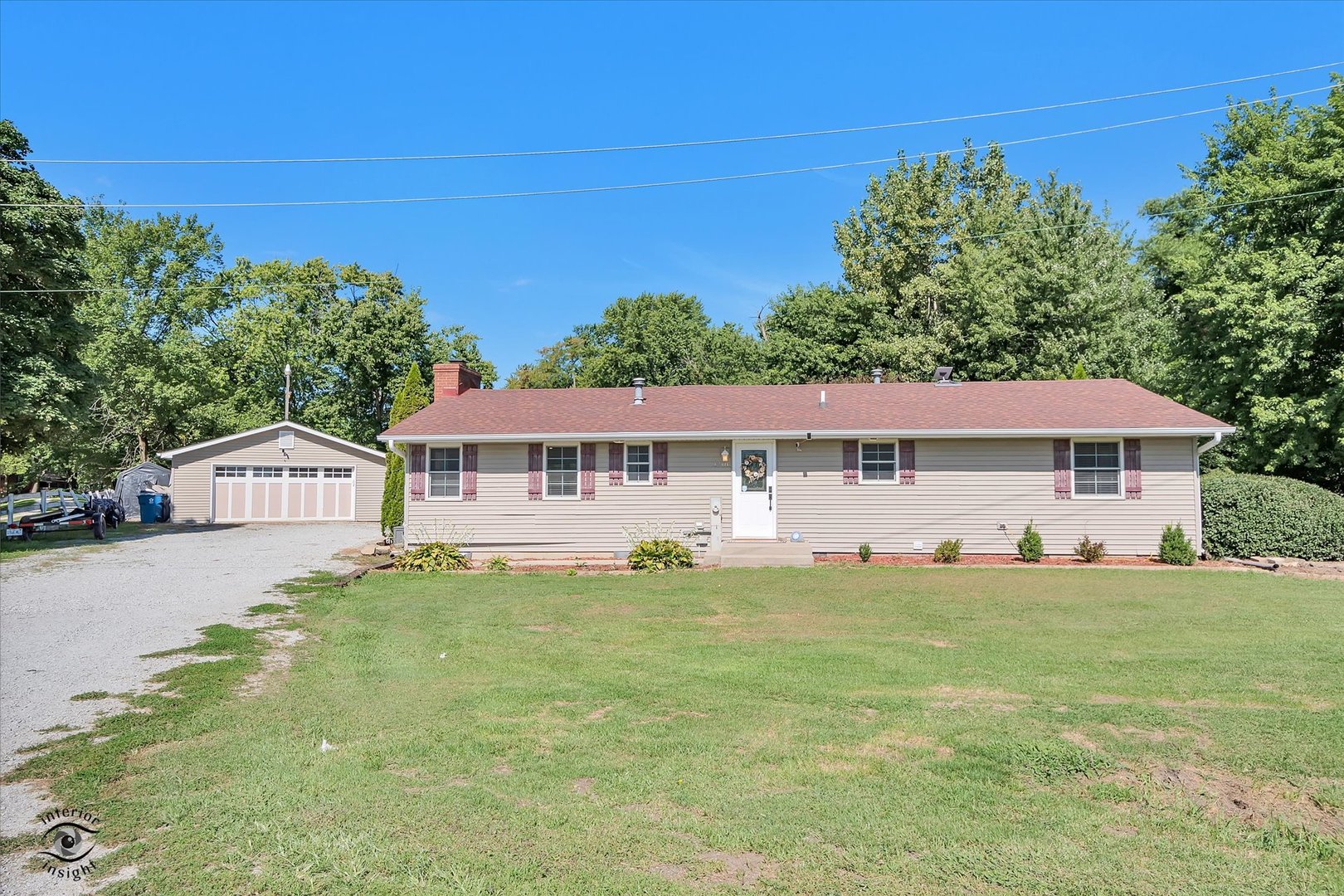 4248 South Youth Camp Road St. Anne, IL 60964 - Photo 2 of 36 a house with trees in the background