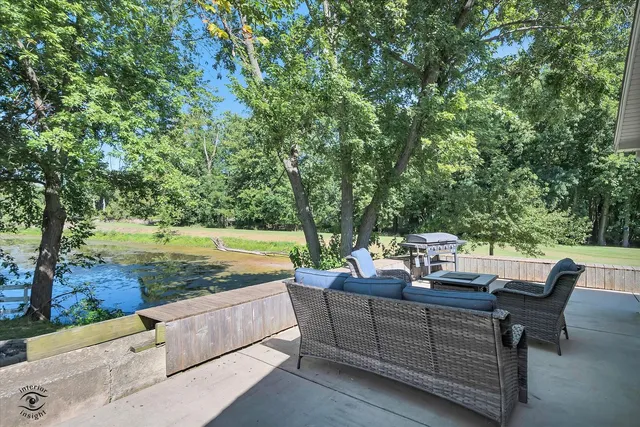 a view of a sitting area with furniture on the deck