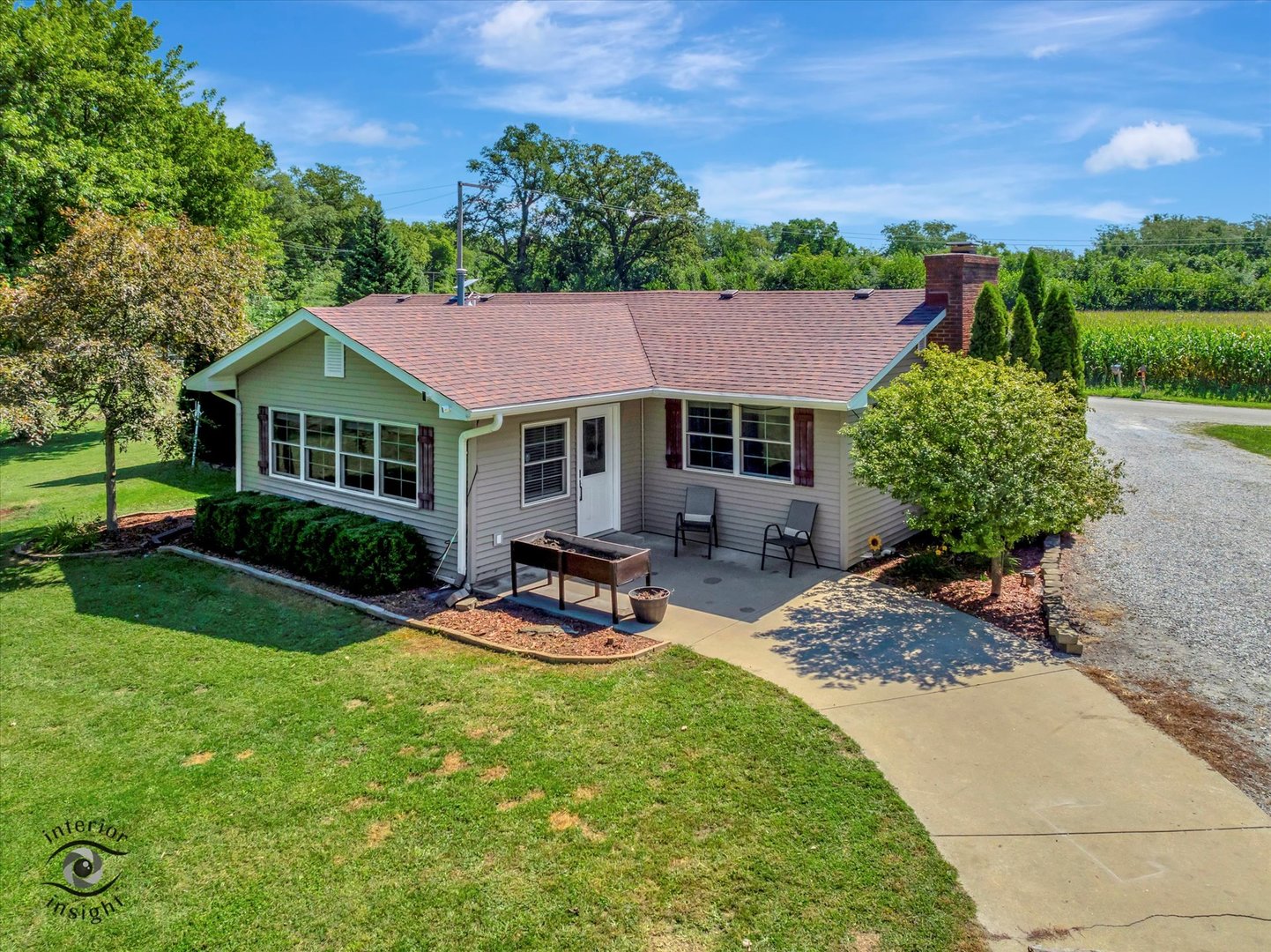 4248 South Youth Camp Road St. Anne, IL 60964 - Photo 27 of 36 a view of a house with garden and sitting area