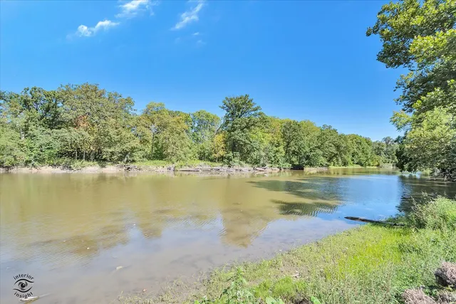 a view of a lake from a yard