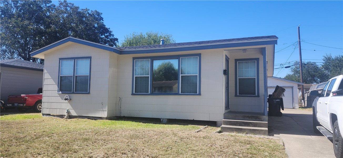a house view with a backyard space