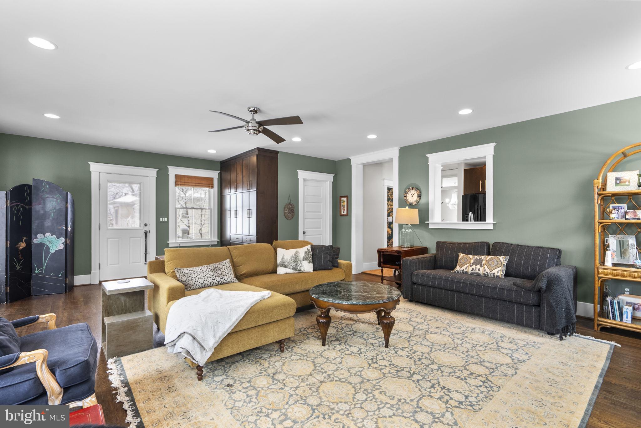 1415 Ballard Street Silver Spring, MD 20910 - Photo 22 of 56 a living room with furniture and a large window