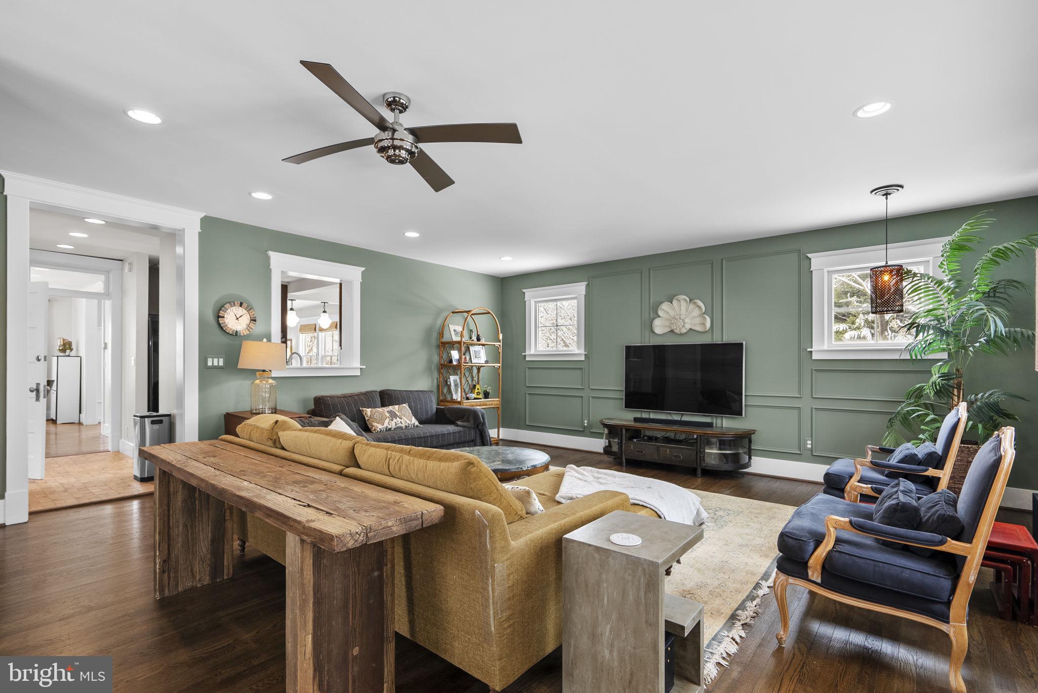 1415 Ballard Street Silver Spring, MD 20910 - Photo 23 of 56 a living room with furniture and a flat screen tv