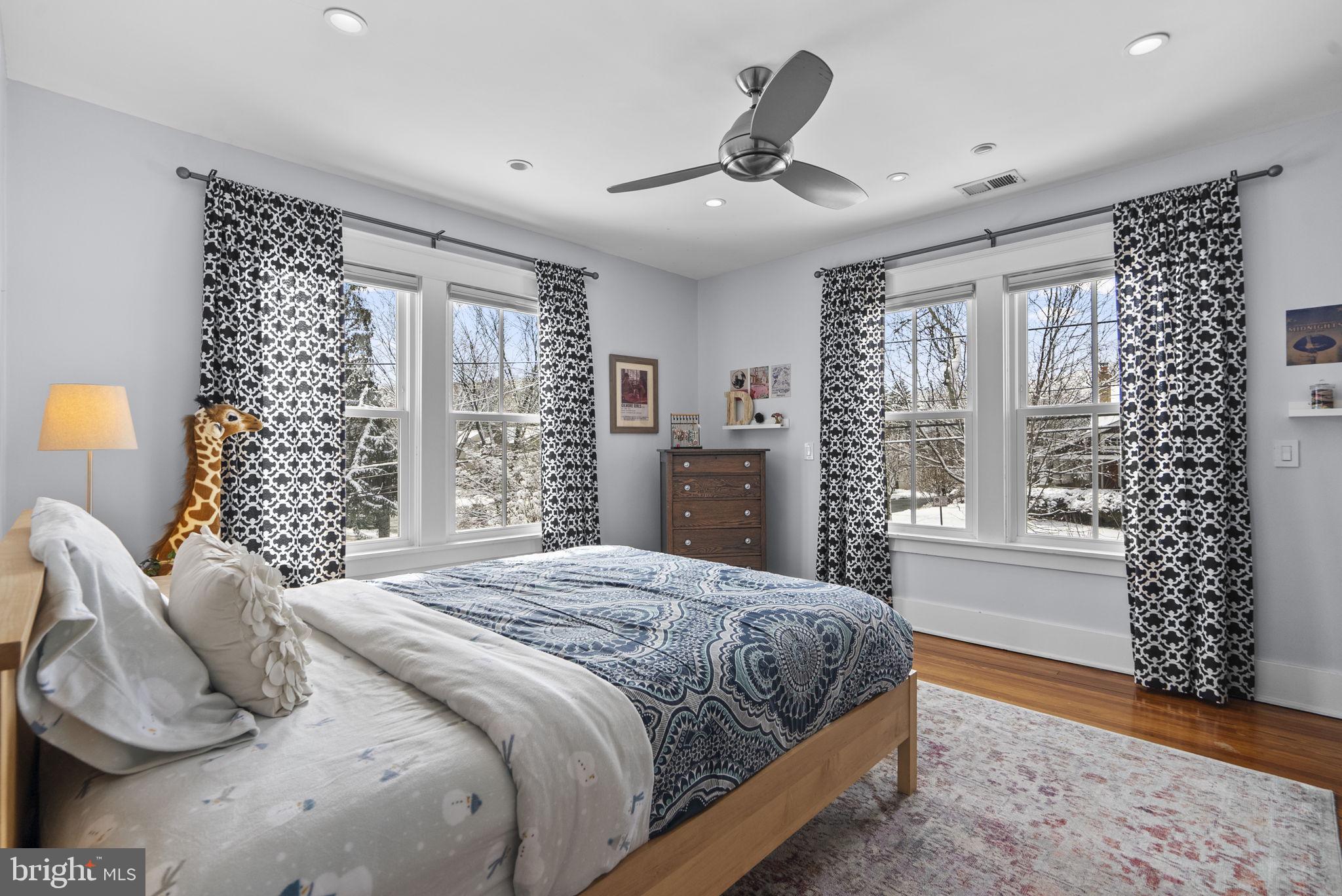 1415 Ballard Street Silver Spring, MD 20910 - Photo 30 of 56 a bedroom with a large bed and a window