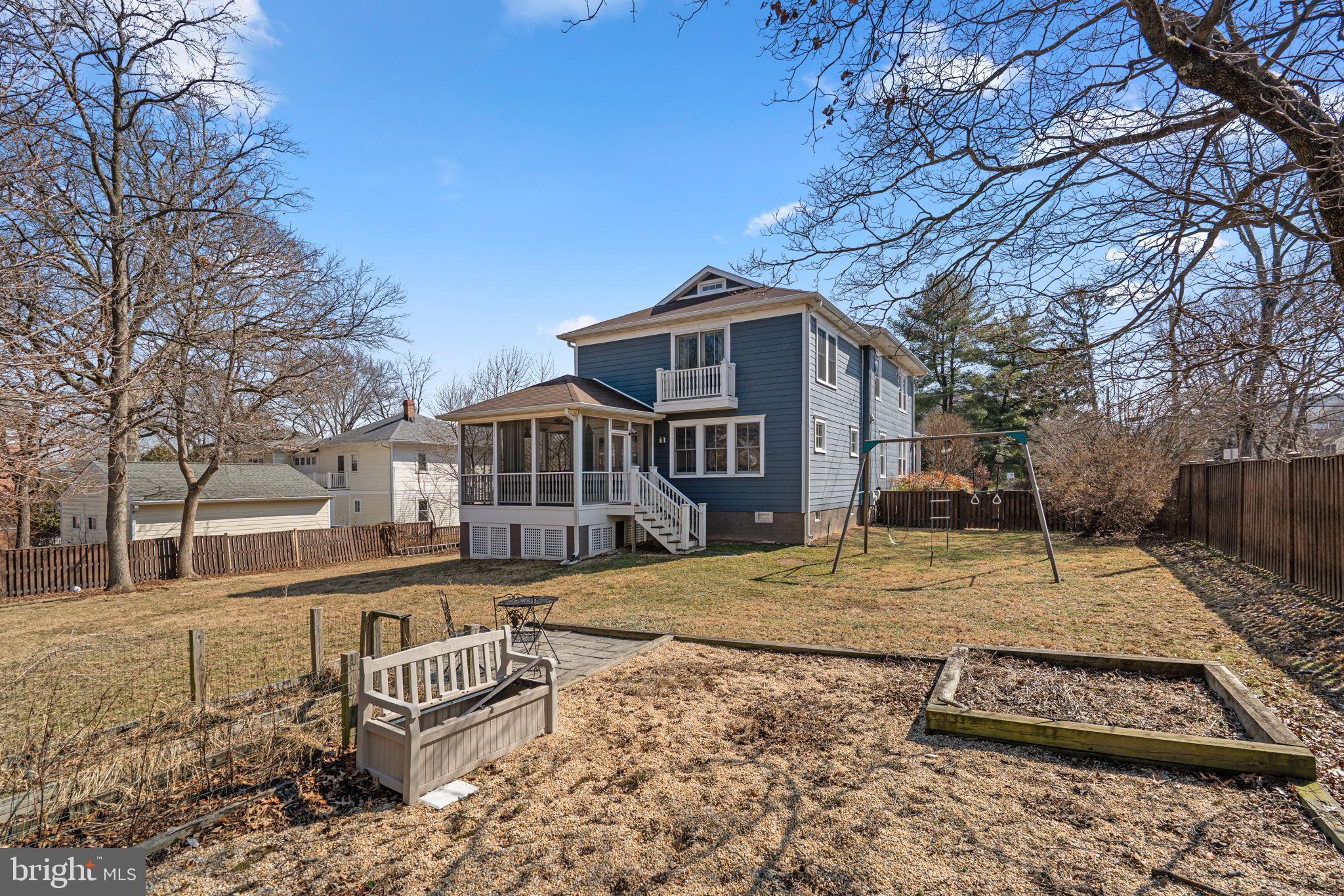 1415 Ballard Street Silver Spring, MD 20910 - Photo 3 of 56 a front view of a house with garden