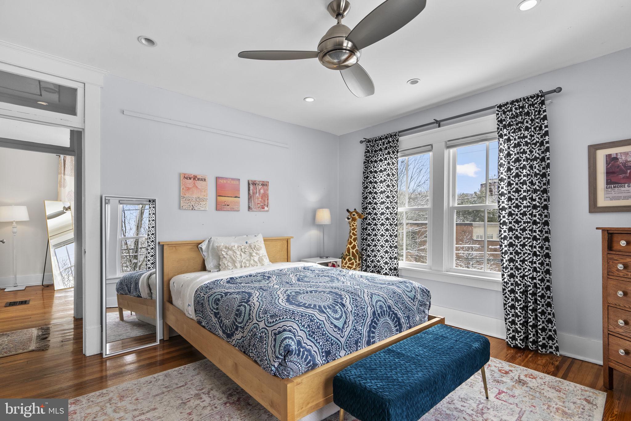 1415 Ballard Street Silver Spring, MD 20910 - Photo 31 of 56 a bedroom with a bed a window and couch