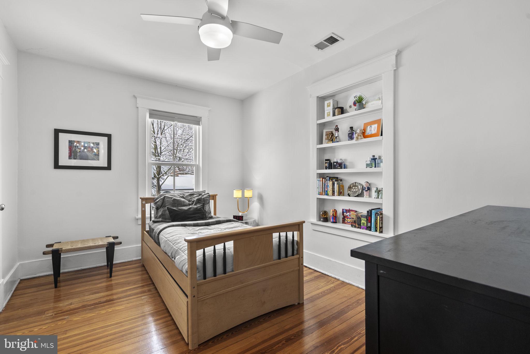 1415 Ballard Street Silver Spring, MD 20910 - Photo 32 of 56 a living room with furniture and a wooden floor