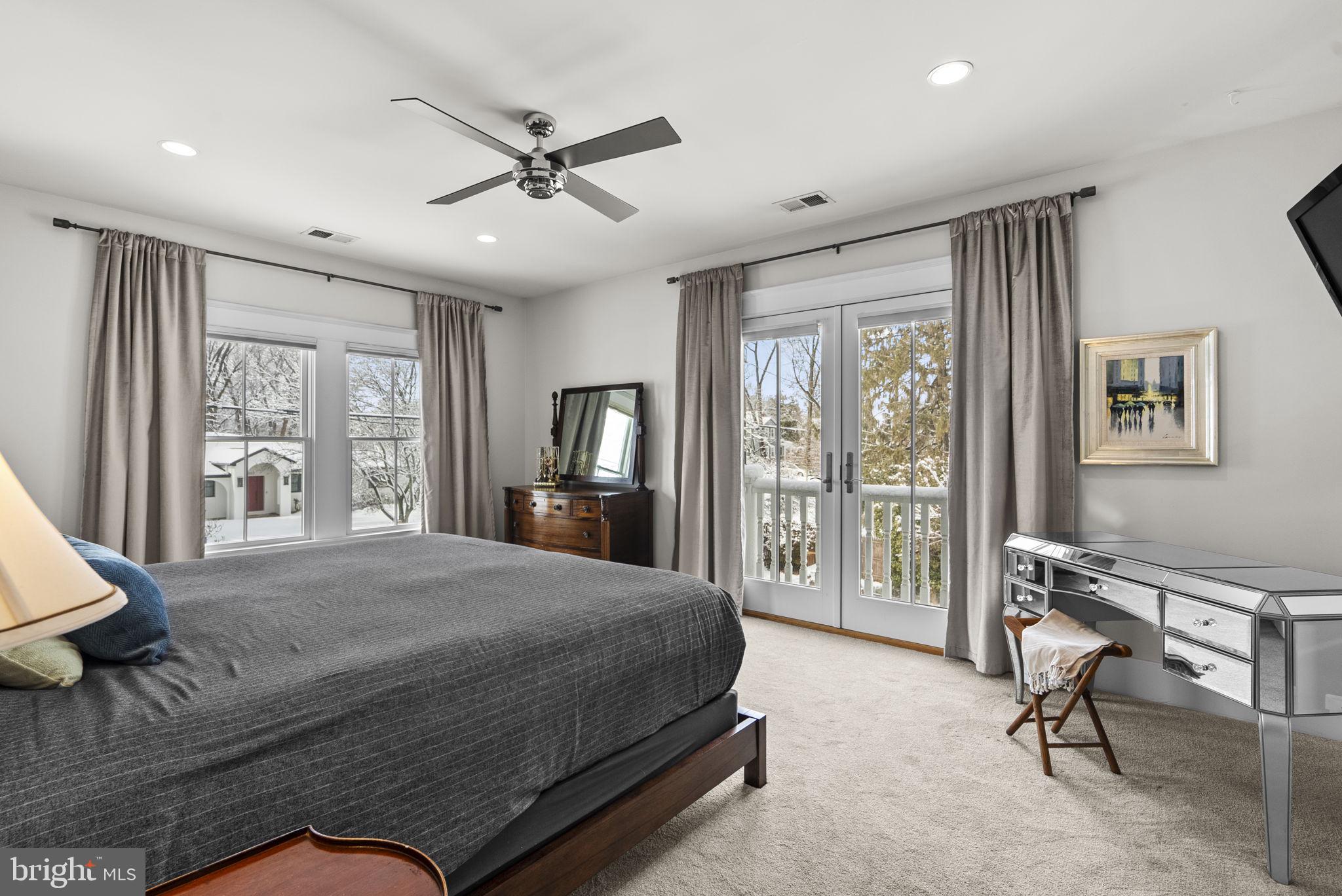 1415 Ballard Street Silver Spring, MD 20910 - Photo 36 of 56 a bedroom with a large bed and a large window