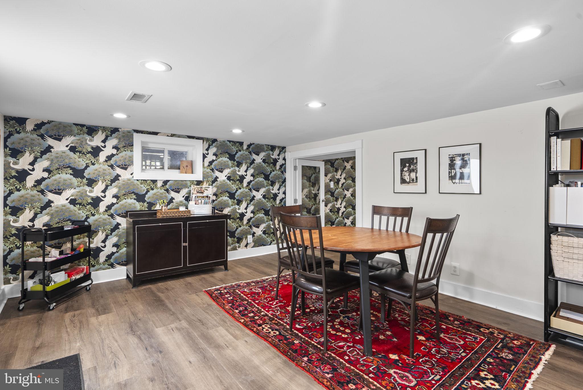 1415 Ballard Street Silver Spring, MD 20910 - Photo 40 of 56 a view of a dining room with furniture and wooden floor
