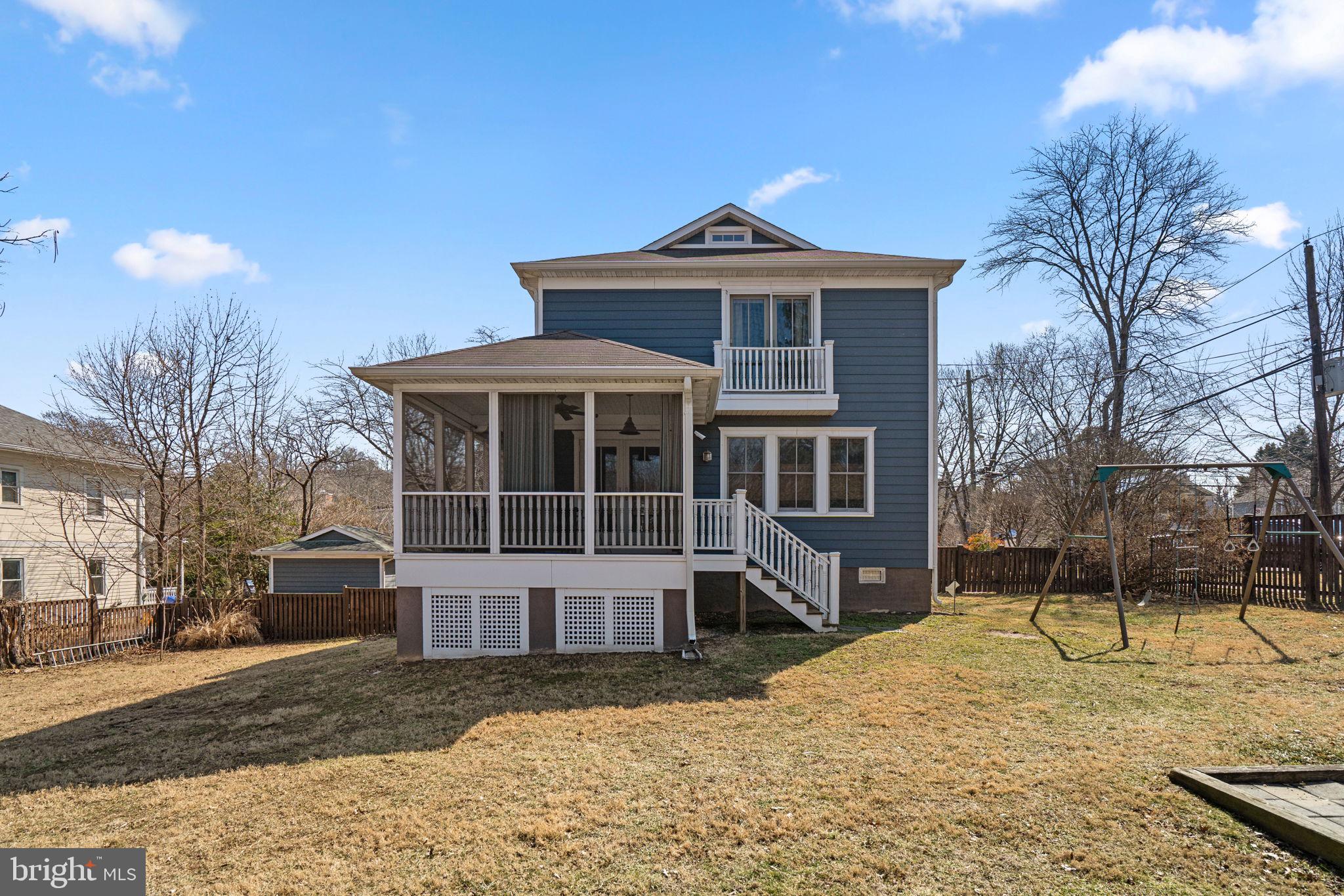 1415 Ballard Street Silver Spring, MD 20910 - Photo 4 of 56 a front view of a house with a yard