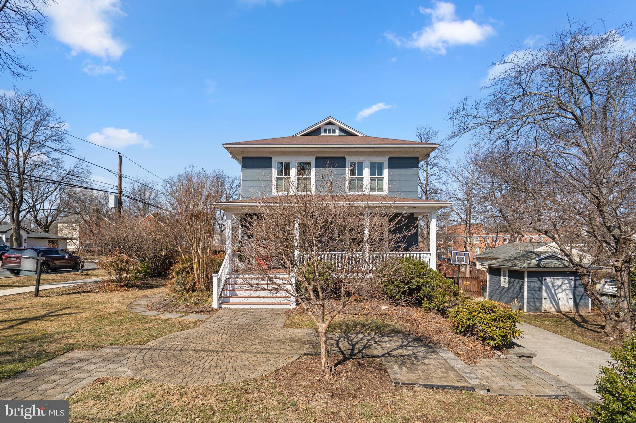 1415 Ballard Street Silver Spring, MD 20910 - Photo 54 of 56 a front view of a house with a yard