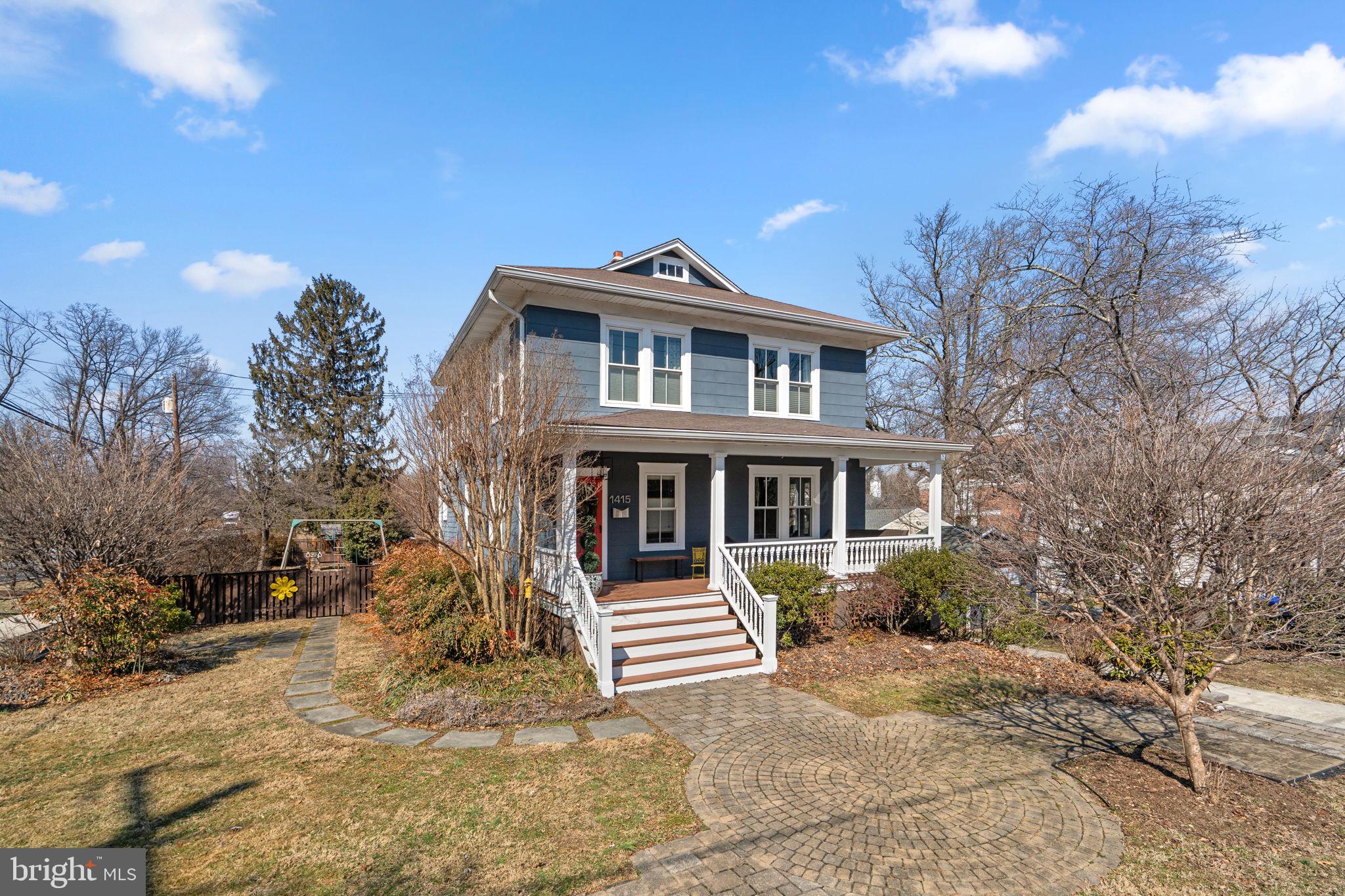 1415 Ballard Street Silver Spring, MD 20910 - Photo 55 of 56 a front view of a house with a yard